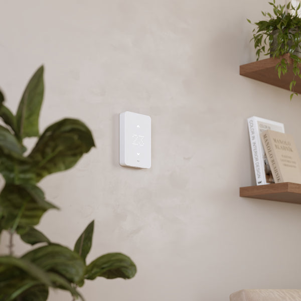 Mysa shows the room temperature on a bright LED display, and the touch arrows let you adjust it