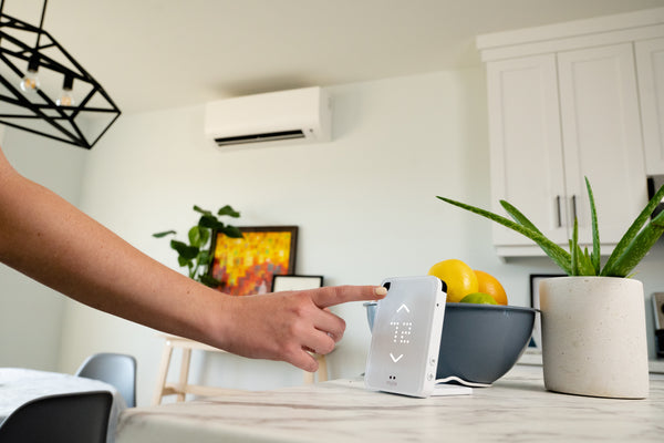 Mysa displays the room temperature, and the touch buttons allow you to adjust it
